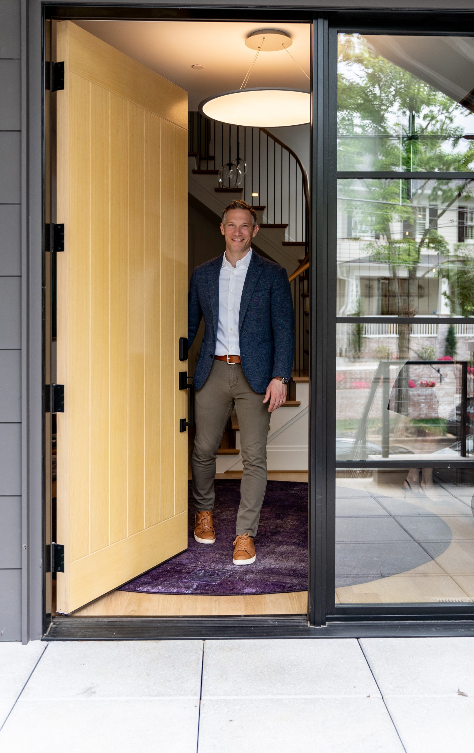 Kevin Carlson welcoming buyers at the door of a DC metro open house.